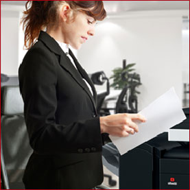 Photo - woman using photocopier - East Pennine Office Equipment.